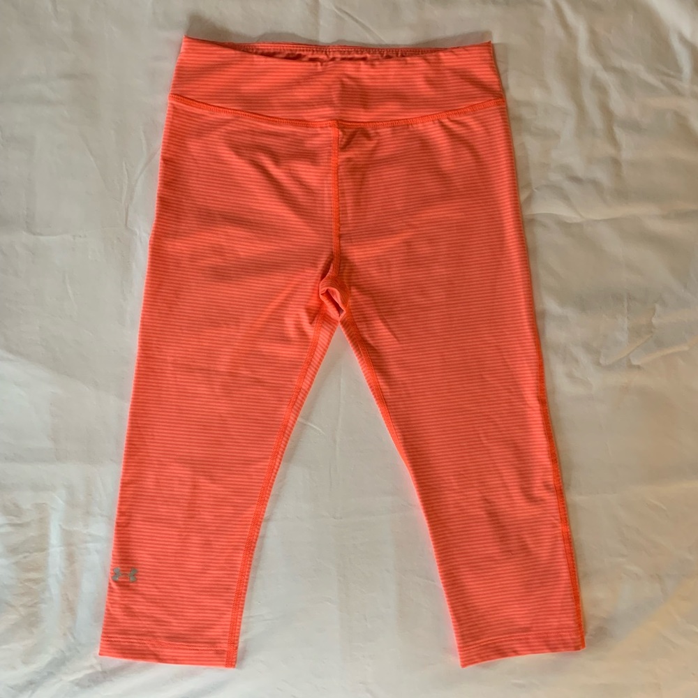 Under armored cropped leggings.